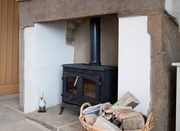A traditional York stone floor and wood burning stove enhance this traditional cottage.