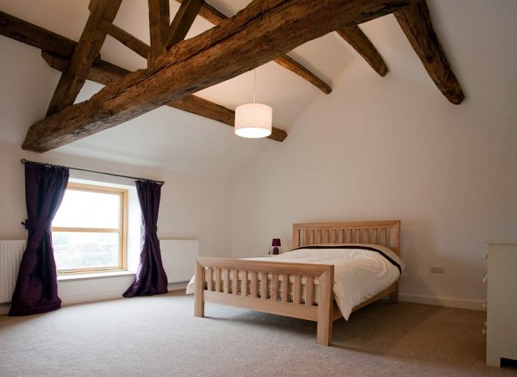 Bedroom showing feature oak beams.